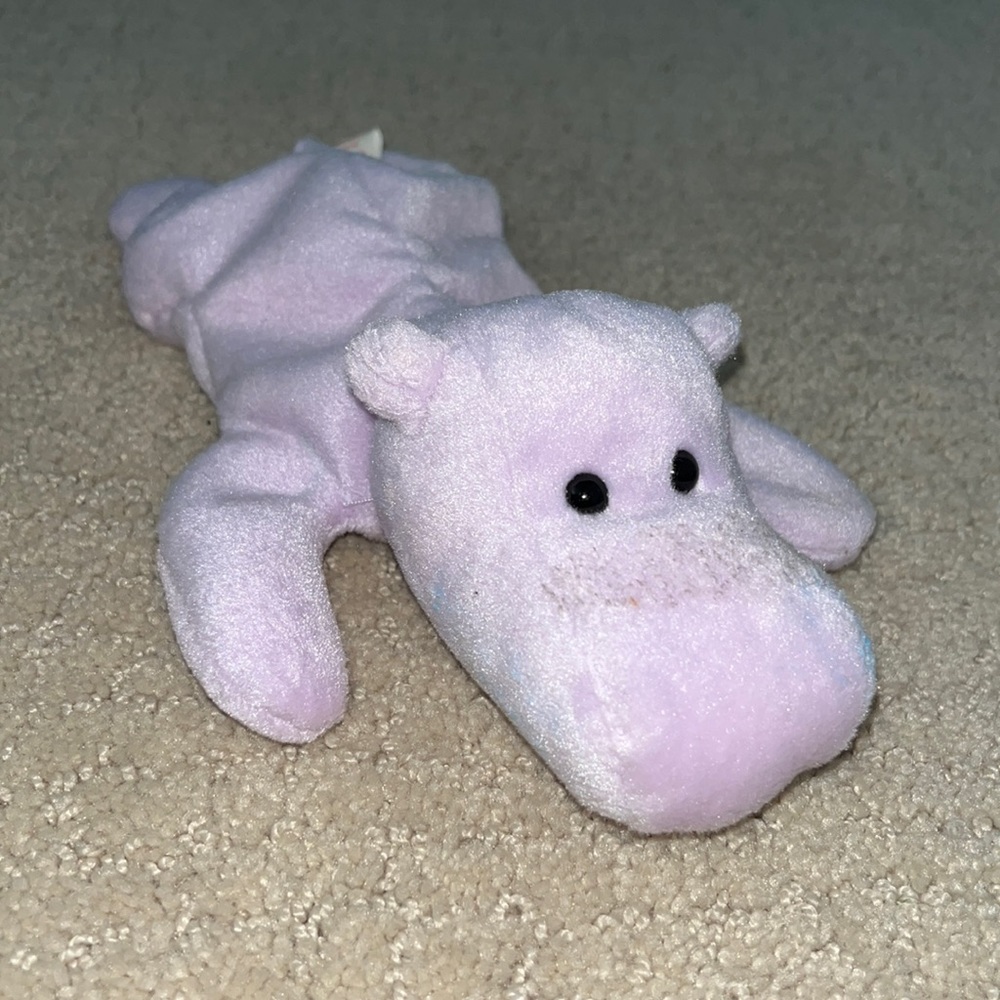 Purple Hippo Beanie Babies named Happy